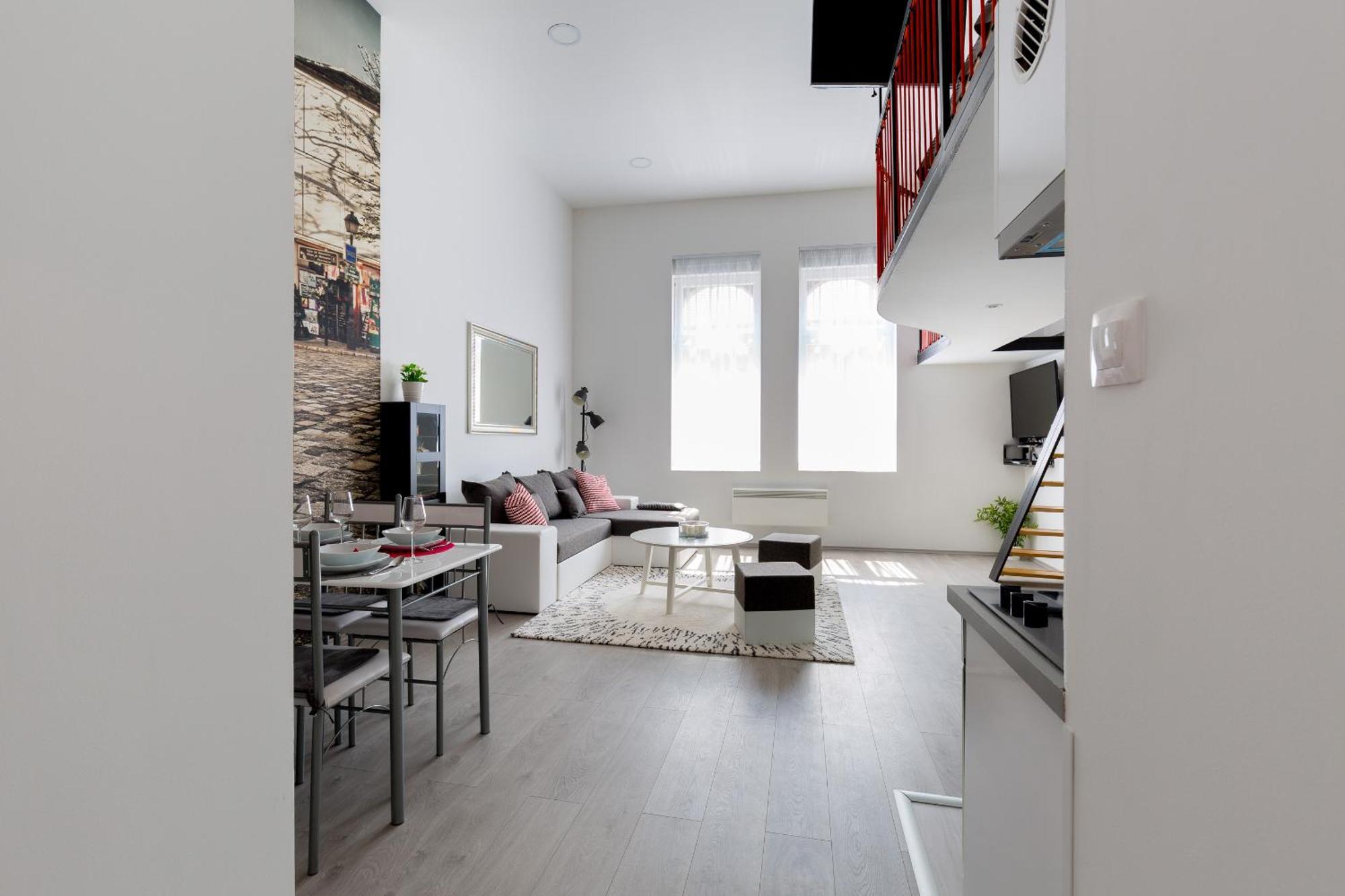 Cobblestone Quarters With A Wave Of Colour Apartment